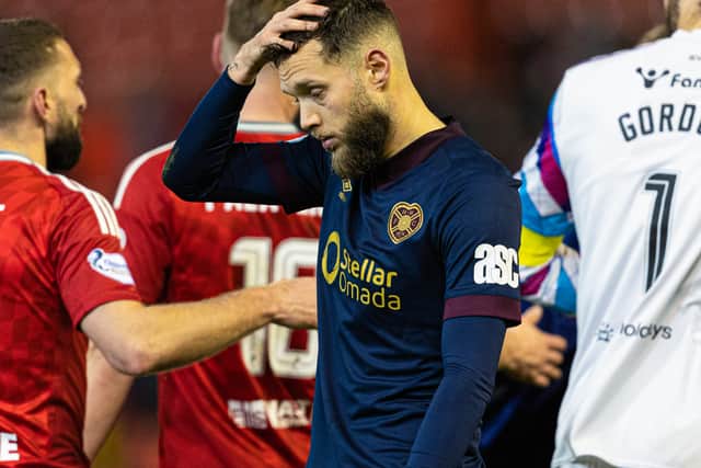 Hearts' Jorge Grant looks dejected after his penalty miss at Aberdeen.