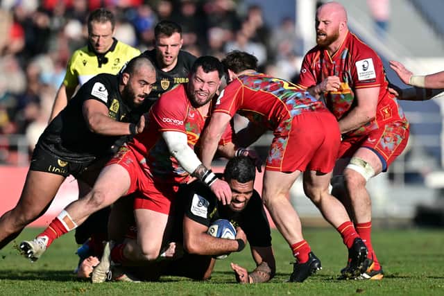 Harlequins' hopes of qualification hang in the balance after losing to Toulon.