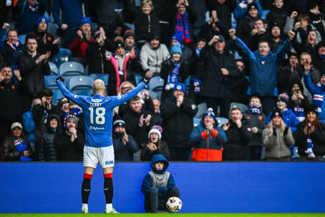 Vaclav Cerny celebrates in front of the Rangers support.
