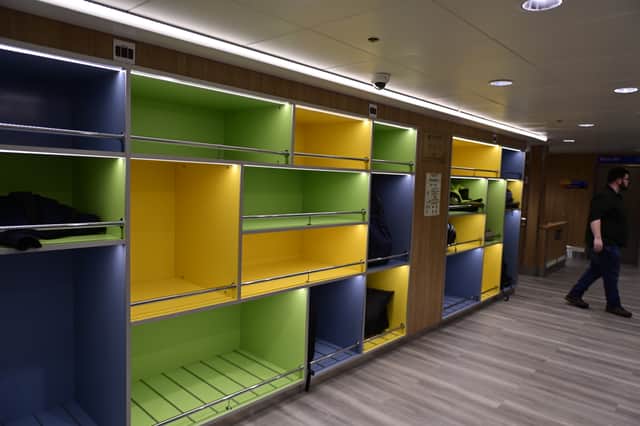 Colourful luggage storage aboard Glen Sannox