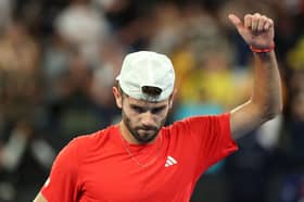 Jacob Fearnley celebrates winning match point against Nick Kyrgios of Australia in the Men's Singles First Round match during day two of the 2025 Australian Open at Melbourne Park.