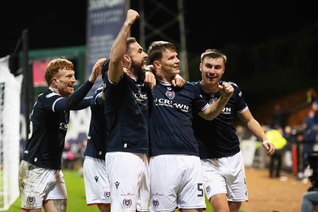 Aaron Donnelly celebrates after putting Dundee 3-2 ahead against Celtic. (Photo by Paul Devlin / SNS Group)