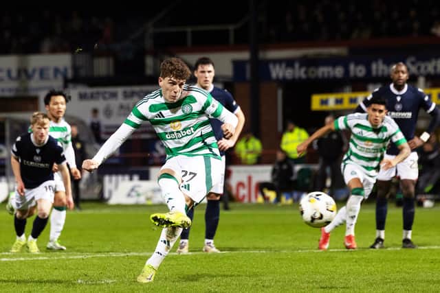 Celtic's Arne Engels scores from the penalty spot to make it 3-3 against Dundee at Dens Park. (Photo by Craig Foy / SNS Group)