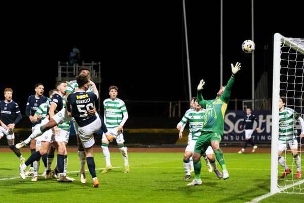 Dundee's Aaron Donnelly scores to make it 3-2 over Celtic at Dens Park. (Photo by Paul Devlin / SNS Group)