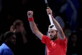 Scotland's Jacob Fearnley celebrates victory over France's Arthur Cazaux during their men's singles match on day four of the Australian Open in Melbourne. (Photo by MARTIN KEEP/AFP via Getty Images)