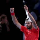 Scotland's Jacob Fearnley celebrates victory over France's Arthur Cazaux during their men's singles match on day four of the Australian Open in Melbourne. (Photo by MARTIN KEEP/AFP via Getty Images)