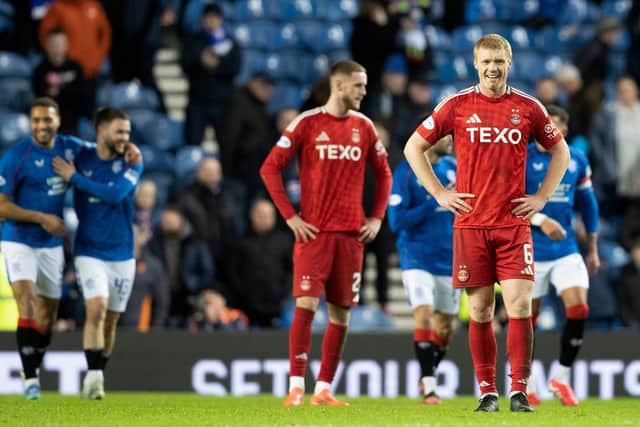 Aberdeen's Sivert Heltne Nilsen looks dejected as Rangers celebrate going 3-0 up at Ibrox. (Photo by Alan Harvey / SNS Group)