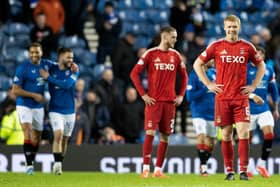 Aberdeen's Sivert Heltne Nilsen looks dejected as Rangers celebrate going 3-0 up at Ibrox. (Photo by Alan Harvey / SNS Group)