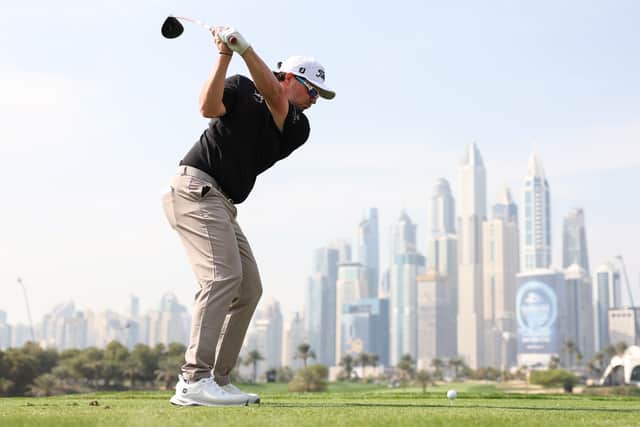 Ewen Ferguson tees off on the eighth hole on day one of the Hero Dubai Desert Classic at Emirates Golf Club 