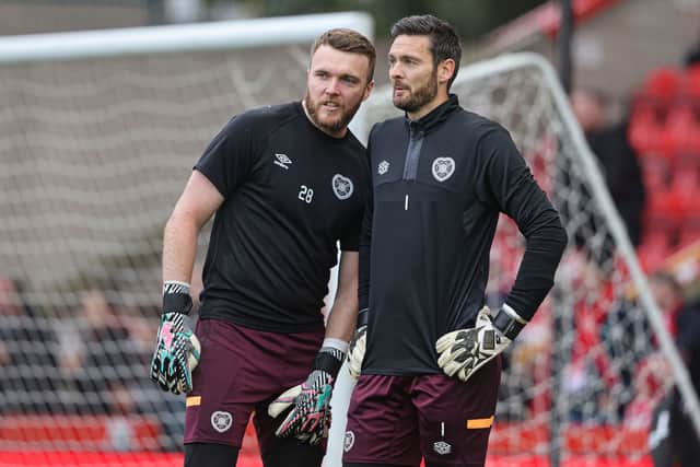 Zander Clark has signed a new contract with Hearts, but Craig Gordon's future still hangs in the balance.