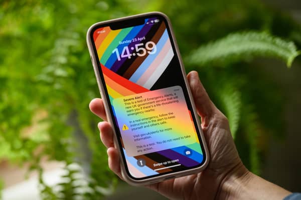 A mobile phone receives the UK nationwide public alert system test signal on April 23, 2023.