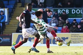Celtic were awarded a penalty after Ross County's James Brown was deemed to have fouled Celtic's Yang Hyun-Jun in the box following a VAR review. (Photo by Paul Devlin / SNS Group)