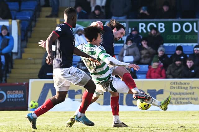 Celtic were awarded a penalty after Ross County's James Brown was deemed to have fouled Celtic's Yang Hyun-Jun in the box following a VAR review. (Photo by Paul Devlin / SNS Group)