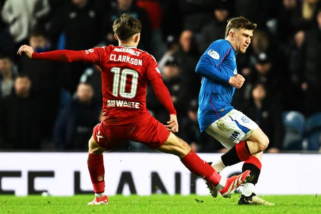 Aberdeen's Leighton Clarkson earned a yellow card for his foul on Rangers' Ridvan Yilmaz. (Photo by Rob Casey / SNS Group)