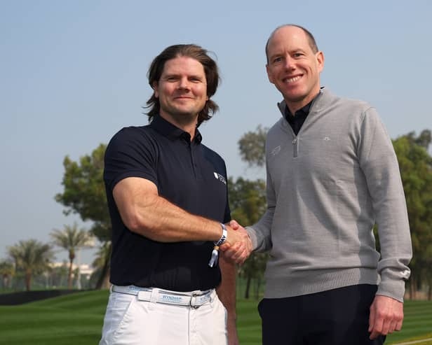 Tim Hentschel, CEO of HotelPlanner, pictured with Jamie Hodges, Challenge Tour director, after an announcement during the Hero Dubai Desert Classic at Emirates Golf Club 