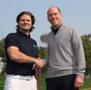 Tim Hentschel, CEO of HotelPlanner, pictured with Jamie Hodges, Challenge Tour director, after an announcement during the Hero Dubai Desert Classic at Emirates Golf Club 