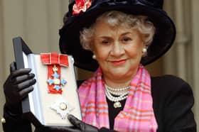 Actress Joan Plowright poses for pictires after being made a Dame by the Prince Of Wales at Buckingham Palace in London, 20 February, 2004.