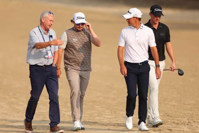 Mark Litton, DP World Tour Director of Rules, speaks to Ewen Ferguson, Jason Scrivener and Daniel Hillier on day three of the Hero Dubai Desert Classic at Emirates Golf Club 