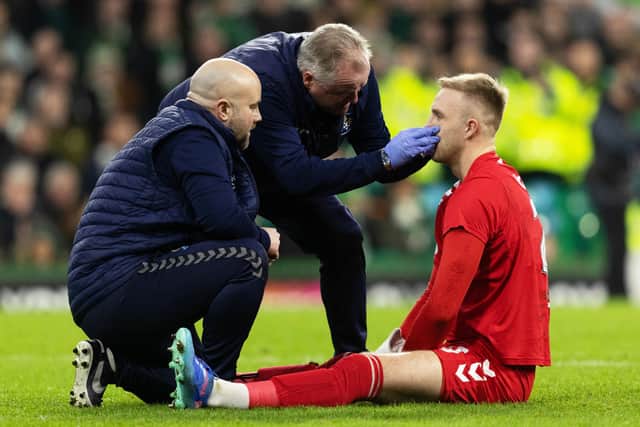 Robby McCrorie is treated after a nasty collision.