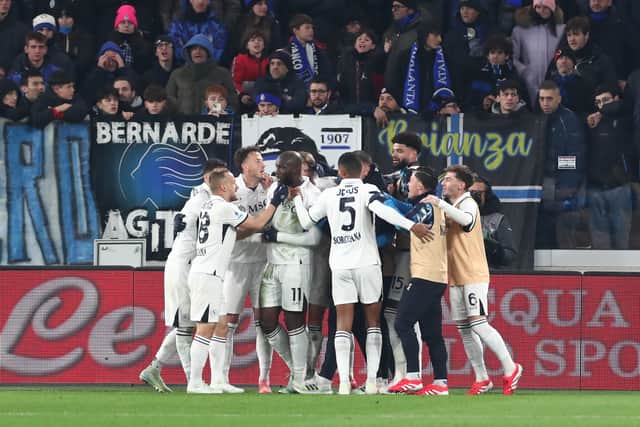 The Napoli players celebrate their win.