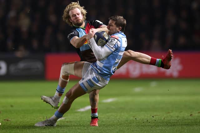 Tyrone Green of Harlequins and Sebastian Cancelliere of Glasgow Warriors compete for the ball.