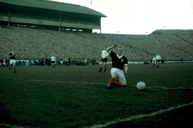 Denis Law, pictured playing at Hampden in 1965.