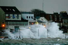 The seafront at Largs is battered by a high wind and rain during a previous "weather bomb", in December 2014