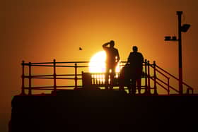 People watch the sunset from North Berwick Harbour. An short-term let application has been rejected in the picturesque East Lothian seaside town