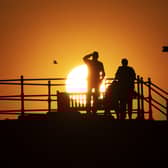 People watch the sunset from North Berwick Harbour. An short-term let application has been rejected in the picturesque East Lothian seaside town