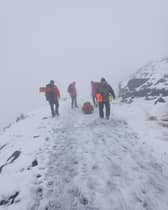 Injured man rescued from snow-covered mountain
