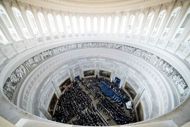 The ceremony took place in the US Capitol Rotunda, a building ripe with symbolism. Picture: Andrew Harnik/Pool/AFP/Getty
