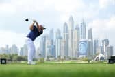 Tyrrell Hatton tees off on the iconic eighth hole at Emirates Golf Club in the final round of the Hero Dubai Desert Classic 