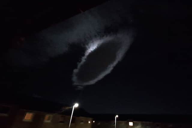 The portal-shaped cloud above Karen Mckeown's home in Tullibody. Picture: Karen Mckeown/SWNS