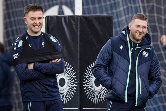 Finn Russell, right, watches on with Fergus Burke during Scotland training at the Oriam.