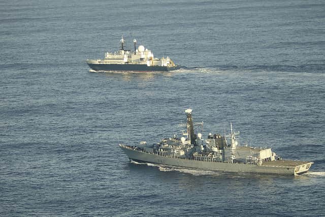HMS Somerset flanking Russian ship Yantar near UK waters. Picture: Royal Navy/PA Wire