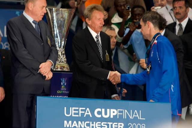 Rangers' David Weir (right) is consoled by Uefa Cup ambassador Denis Law following the defeat to Zenit St Petersburg in the 2008 Uefa Cup final.