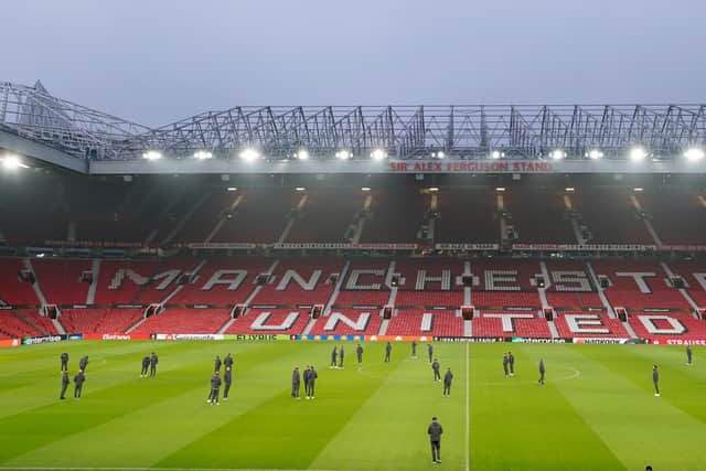 Rangers players inspect the pitch before a press conference at Old Trafford, Manchester. Picture date: Wednesday January 22, 2025.