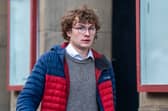 Joe Madden arrives at Edinburgh Sheriff Court to be sentenced after admitting damaging the Stone of Destiny display cabinet in the crown jewels room at Edinburgh Castle 