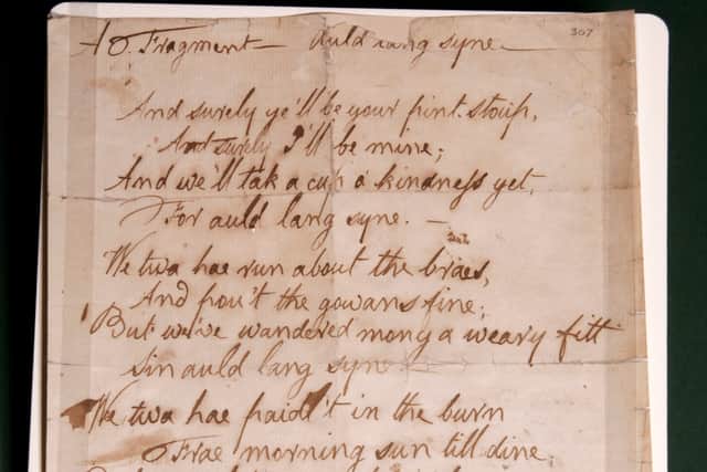 A fragment of Auld Lang Syne by Robert Burns.