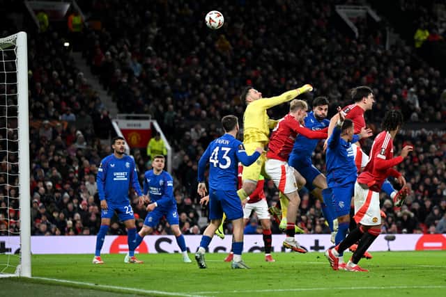 Jack Butland's punch loops into his own net to give Manchester United the lead.