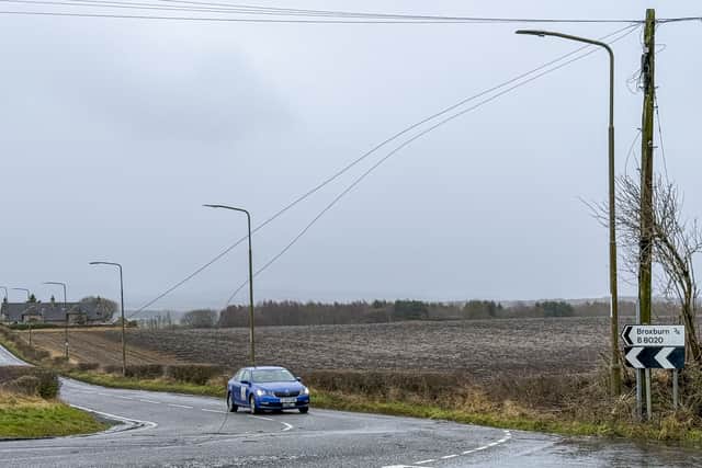Trees fell on power lines between Winchburgh and Broxburn on the B8020. Picture: Lisa Ferguson
