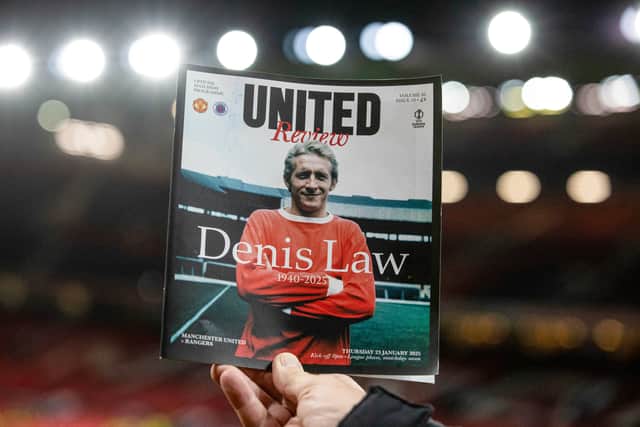 Manchester United paid tribute to Denis Law with a special edition of their match programme for the Europa League fixture against Rangers at Old Trafford. (Photo by Alan Harvey / SNS Group)