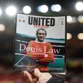 Manchester United paid tribute to Denis Law with a special edition of their match programme for the Europa League fixture against Rangers at Old Trafford. (Photo by Alan Harvey / SNS Group)