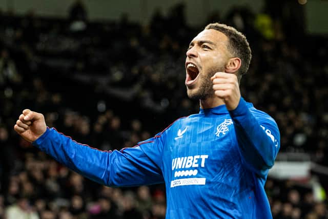 Rangers' Cyriel Dessers celebrates as he scores to make it 1-1 during a UEFA Europa League 2024/25 League Phase MD7 match between Manchester United and Rangers.