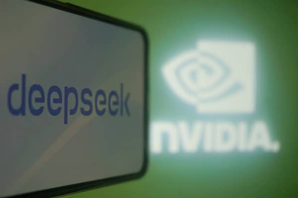 This photo illustration shows the DeepSeek and Nvidia logos on screens in Hangzhou, in China's eastern Zhejiang province on January 27, 2025