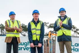 David Rickman MBE performs the ground-breaking ceremony flanked by Provost of Fife Jim Leishman, left, and The R&A chief executive Mark Darbon, right 