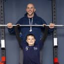 Havery Dooher and his dad David have both raised money for research into motor neurone disease by doing remarkable sporting feats