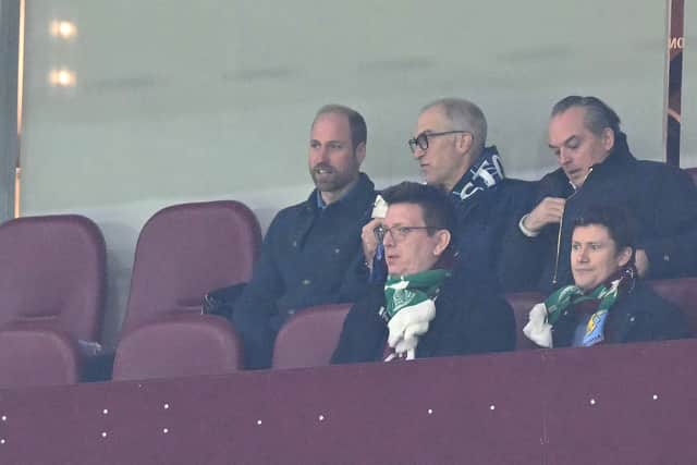 Prince William watches on from the stands during the UEFA Champions League football match between Aston Villa and Celtic. (Photo by JUSTIN TALLIS/AFP via Getty Images)
