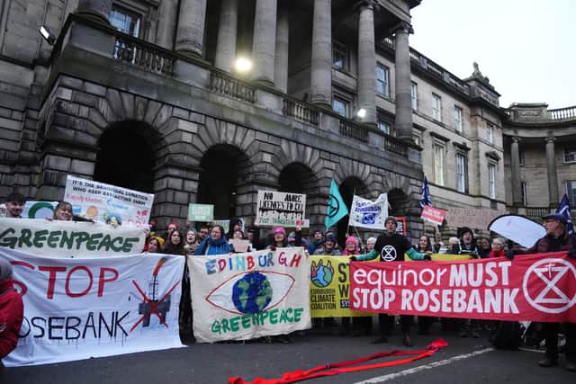 Climate campaigners protest against the Rosebank oil and Jackdaw gas proposals outside the Court of Session in Edinburgh