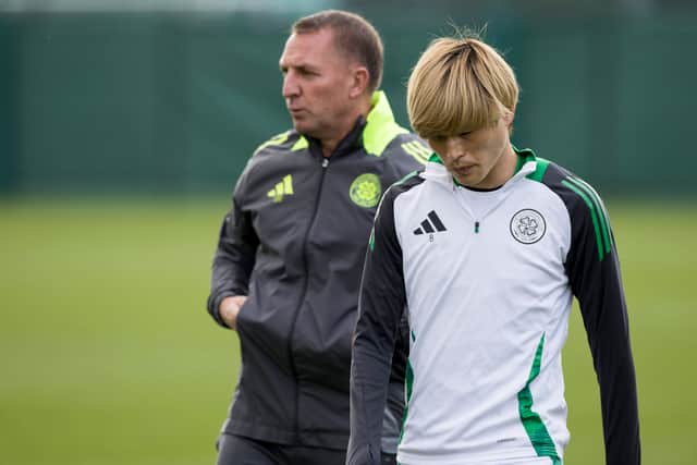 Kyogo Furuhashi and Brendan Rodgers during a Celtic training session at Lennoxtown. (Photo by Craig Williamson / SNS Group)